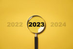 2023 year inside of magnifier glass
